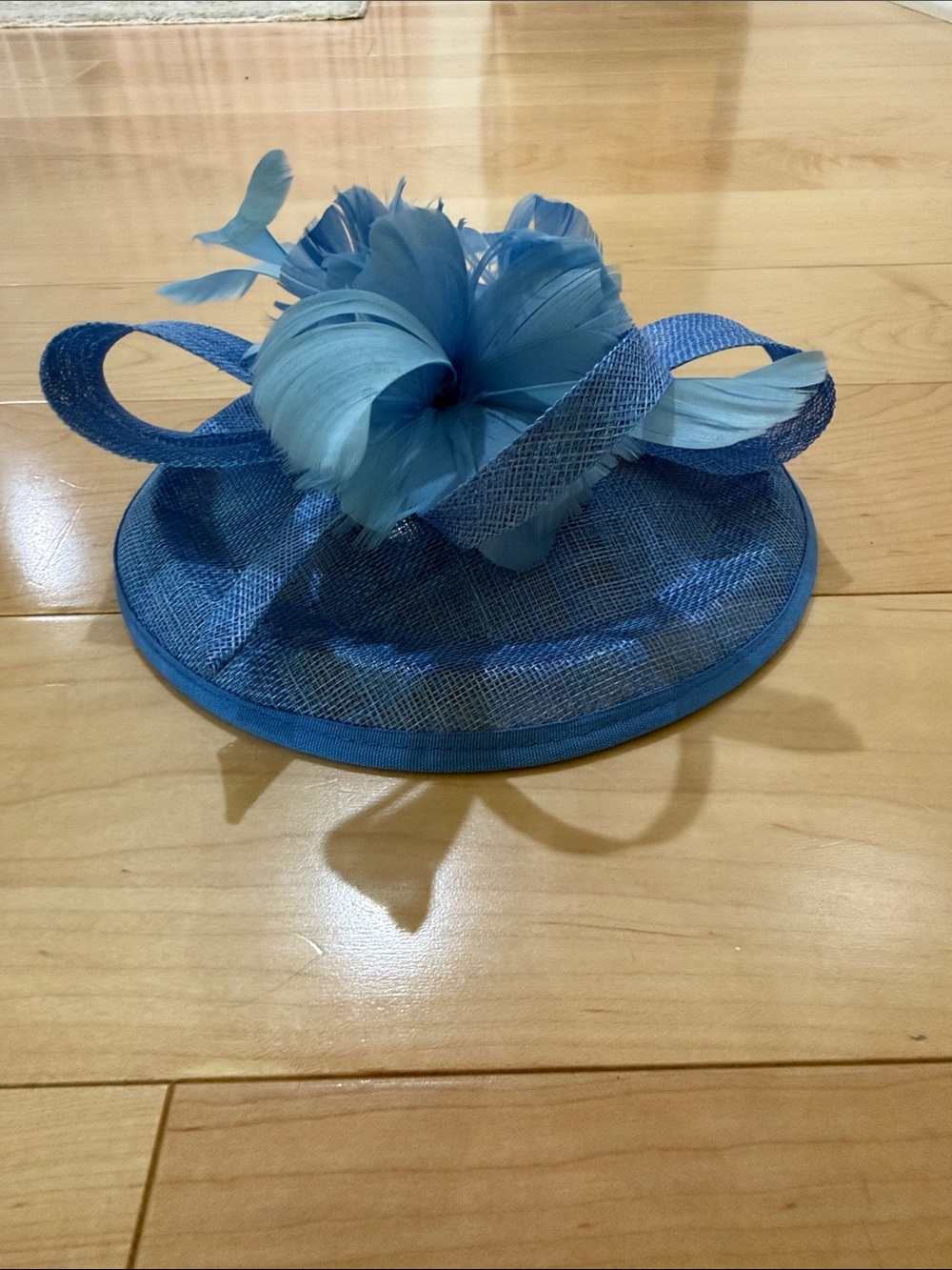 Blue Feathered Fascinator Hat with Floral Detail